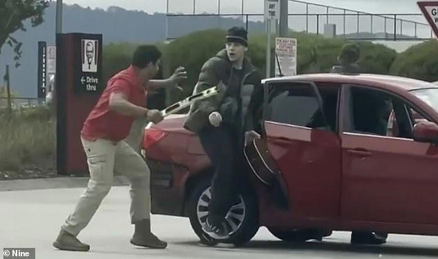 Wild moment delivery driver turns the tables on two alleged armed ...