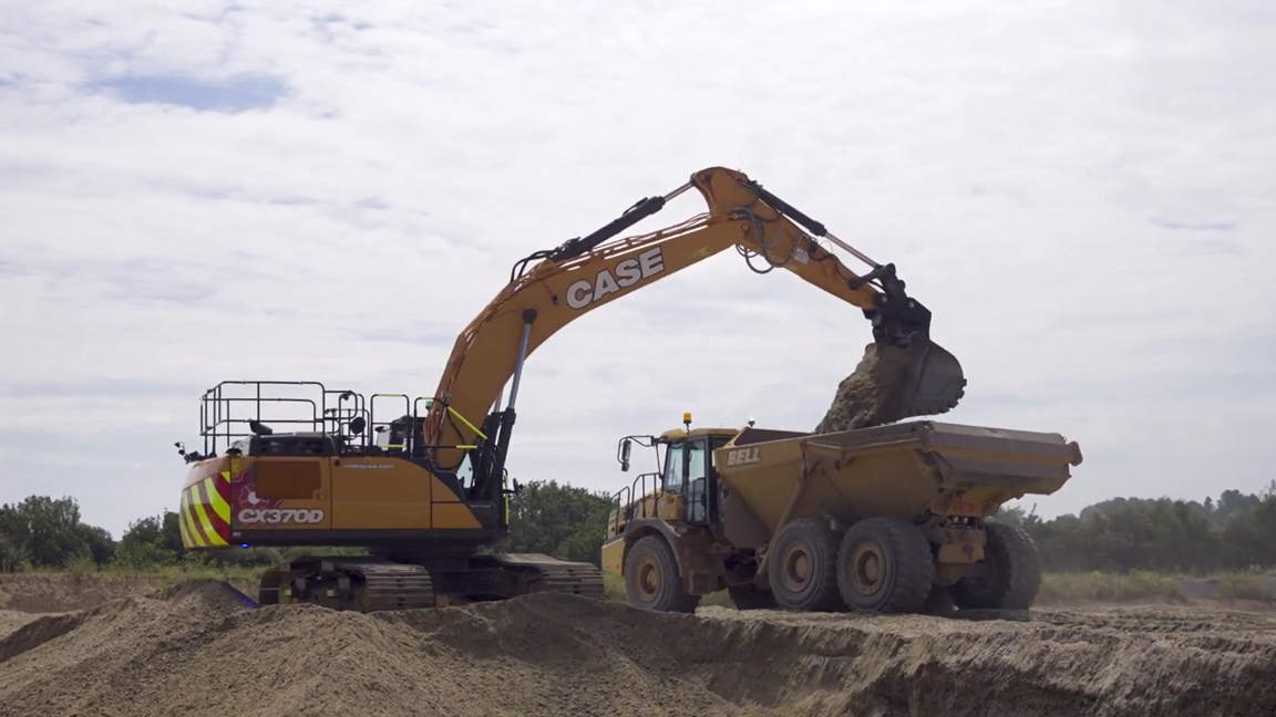 Heavy machine that loads massive trucks effortlessly