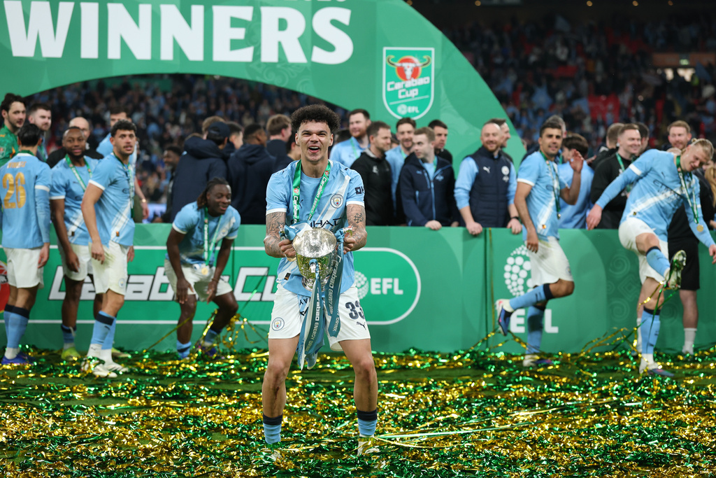 Man City dominates Arsenal to win English League Cup and make statement in Premier League title race<br><br>