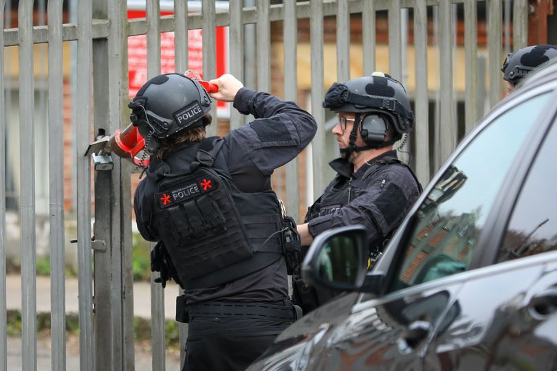 Police issue update after armed officers storm industrial unit near ...