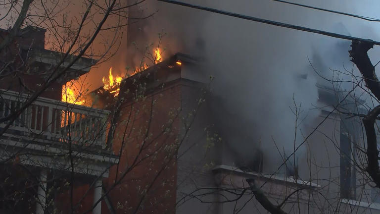 Firefighters battle two-alarm fire in Old Louisville home