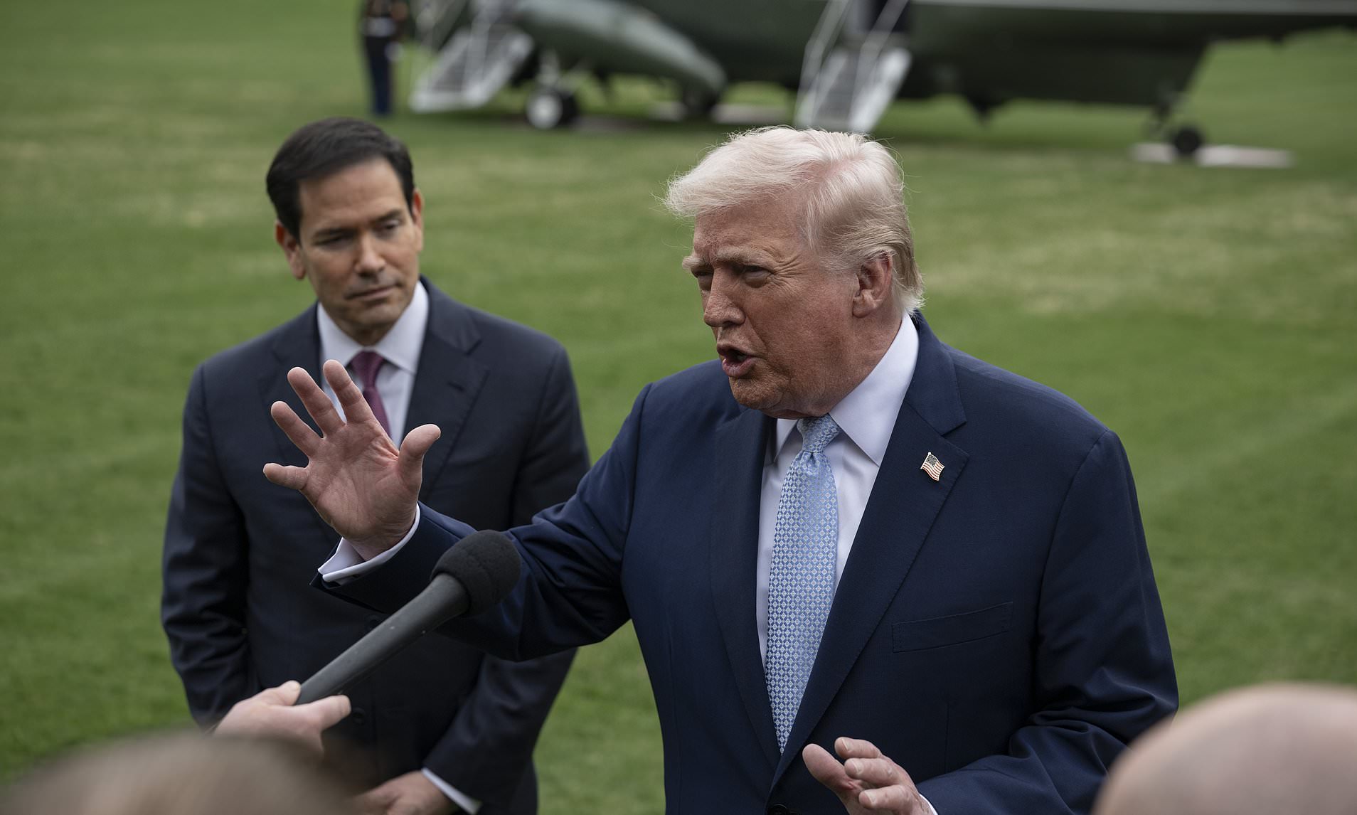 Trump halts all strikes on Iran after 'very good conversations'