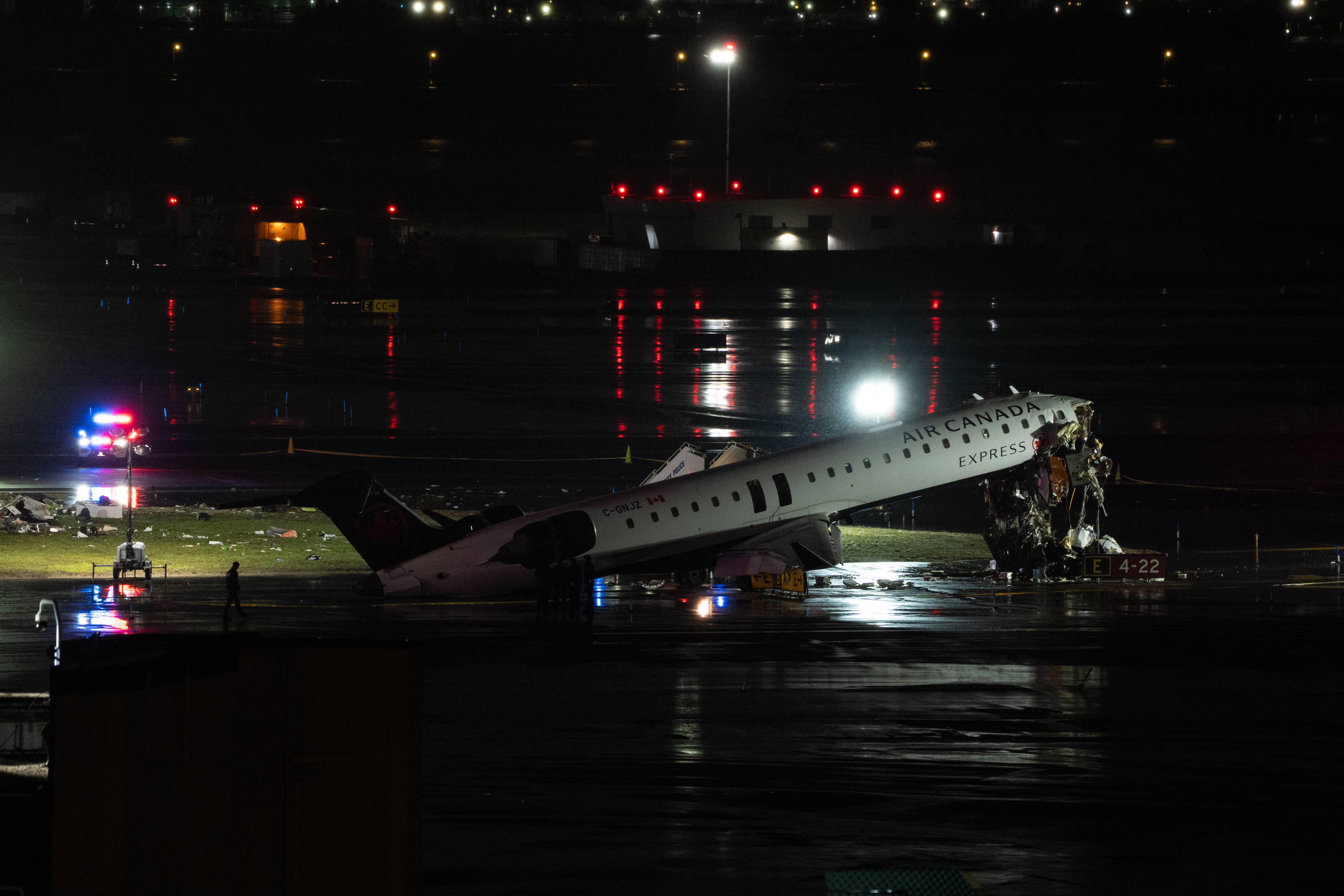 Air Canada passenger shares photos of damaged plane on Reddit while getting medical checkup on LaGuardia Airport tarmac after crash<br><br>