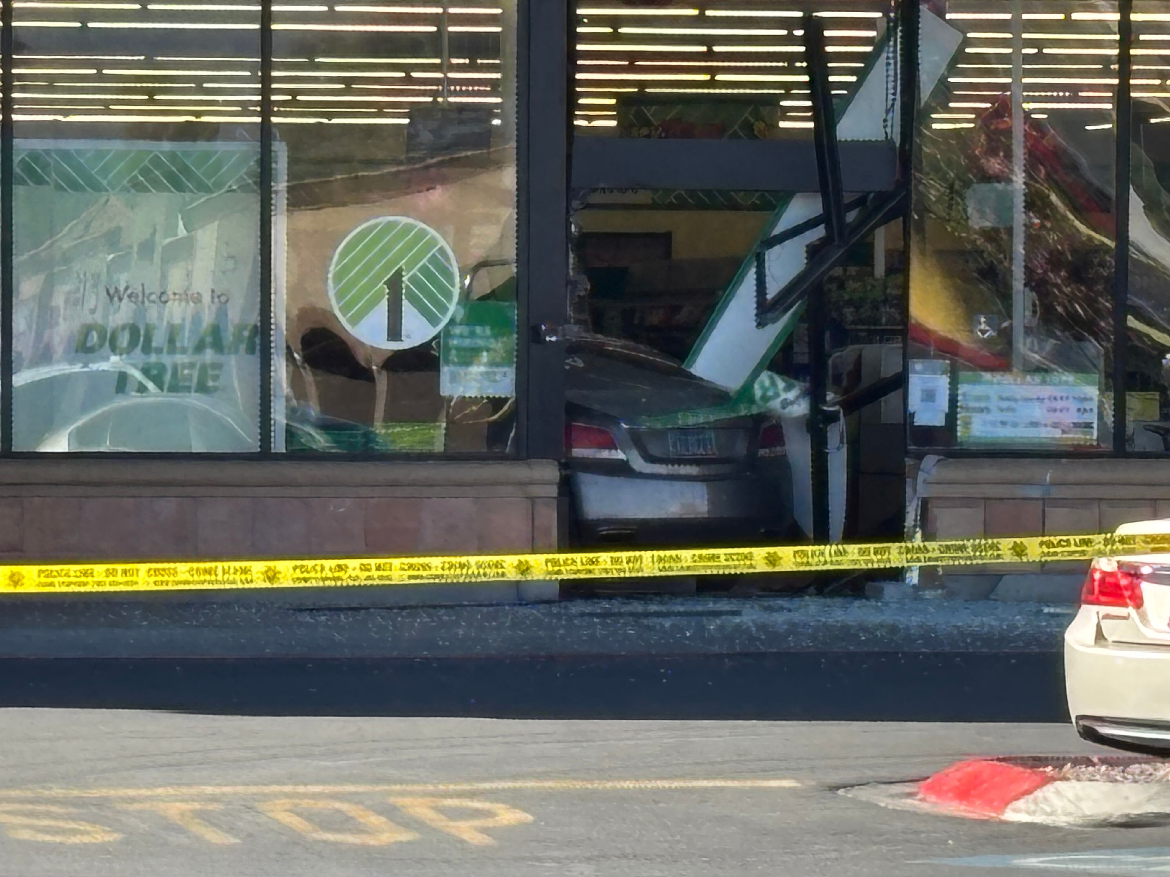 Knife attack, gunfire erupt after suspect drives into Dollar Tree in ...