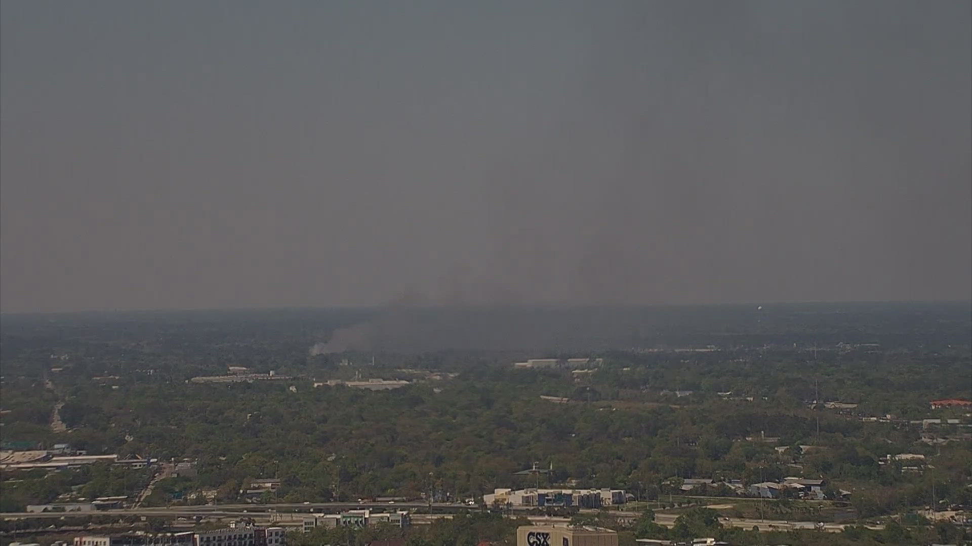 Junkyard car fire causing massive plume of smoke west of downtown ...