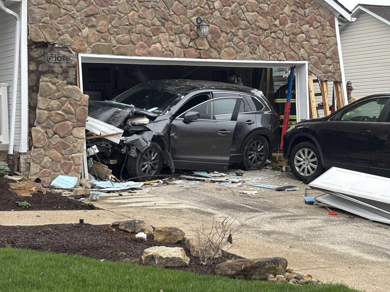 SUV demolishes side of garage in Westmoreland County, ends up inside