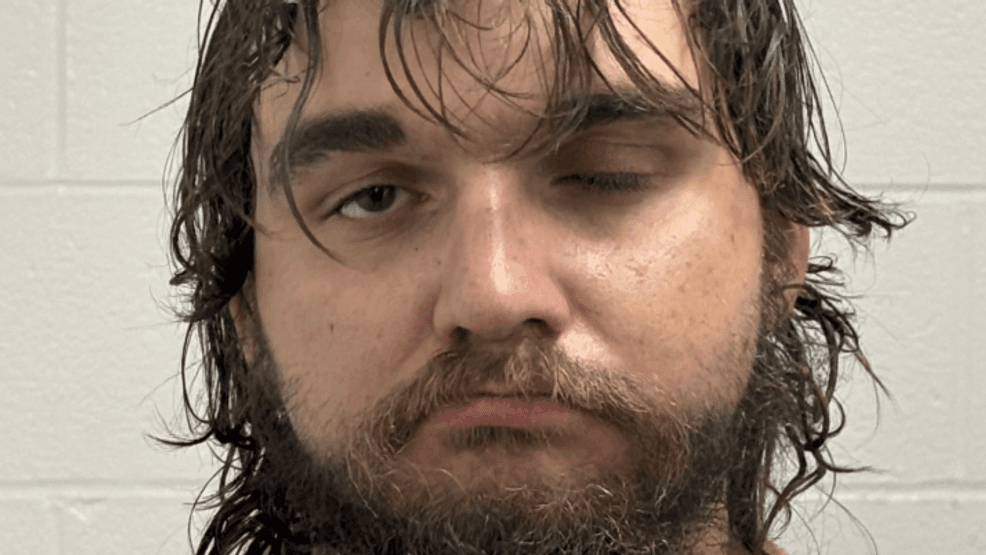 Suspect arrested after shooting at man in bank drive-thru, aiming long ...