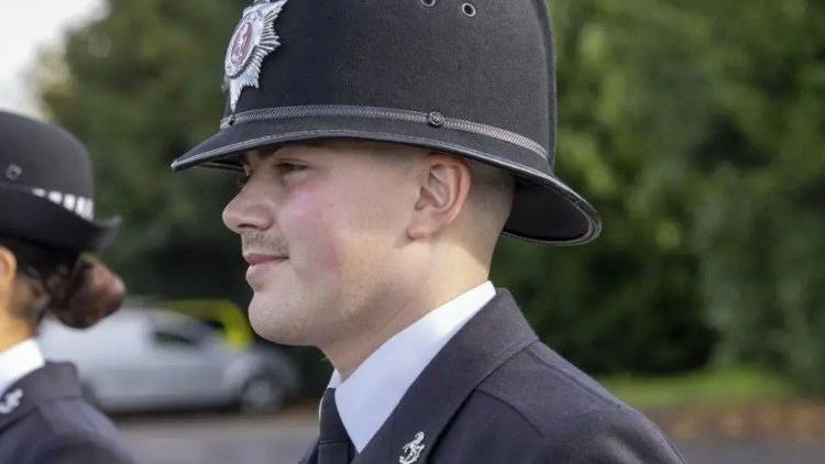 Home secretary pays tribute to PC killed in crash<br>