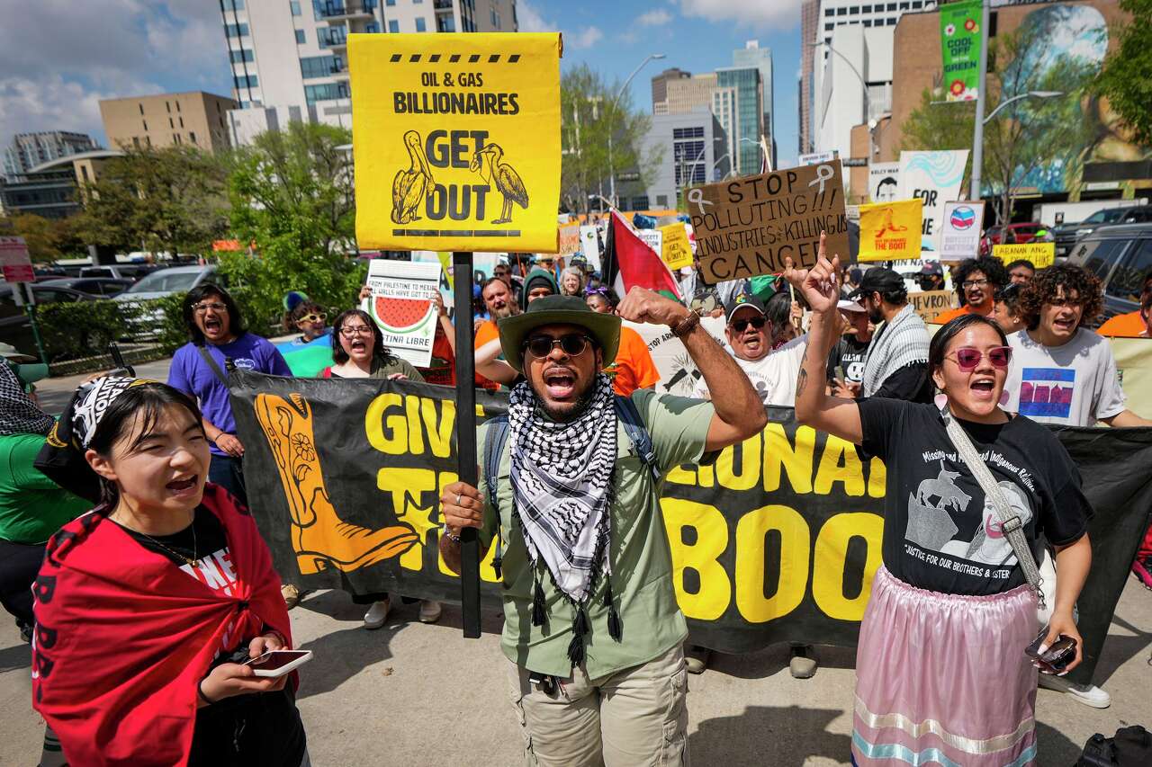 Protesters march against oil industry leaders at Houston's CERAWeek ...