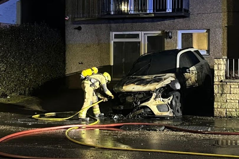 Horror as car bursts into flames in Edinburgh street while driver inside