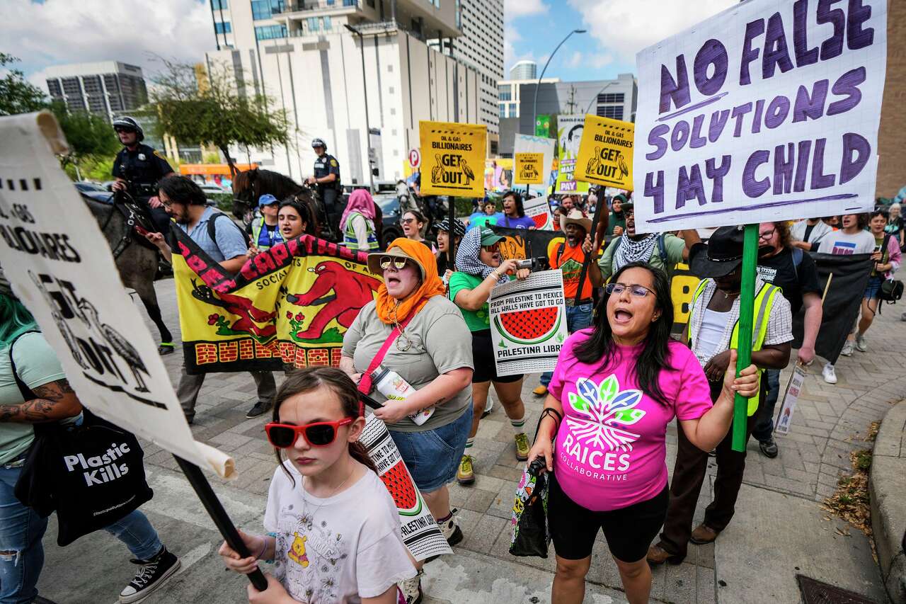 Protesters march against oil industry leaders at Houston's CERAWeek ...