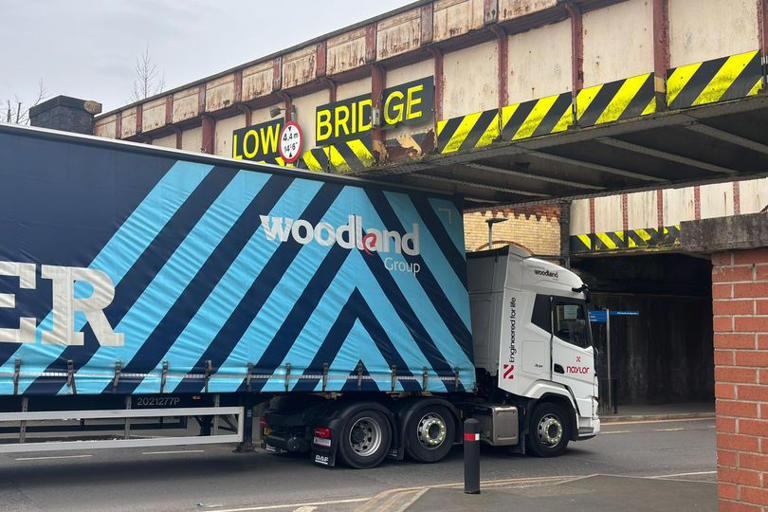 Road closed off after lorry becomes wedged under railway bridge