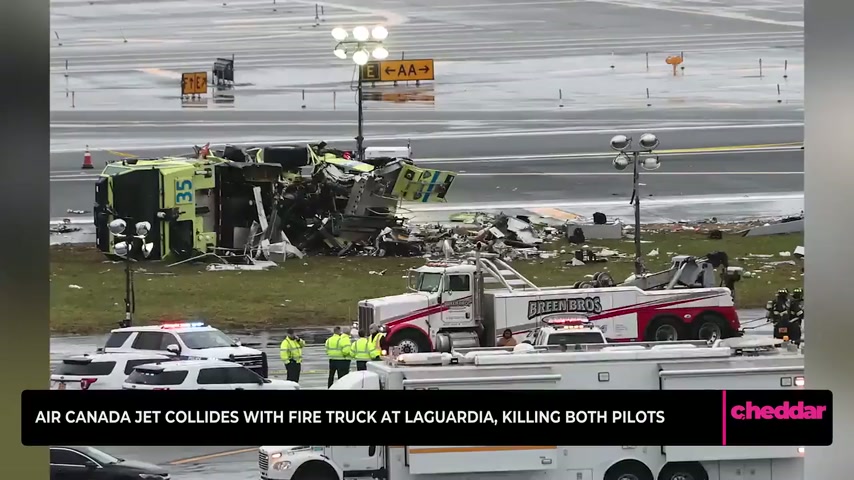 Air Canada jet collides with fire truck at LaGuardia, killing both pilots
