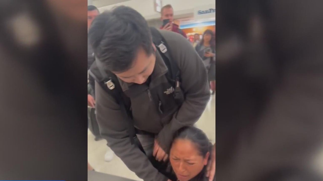 Video shows federal immigration officers restraining woman at San ...