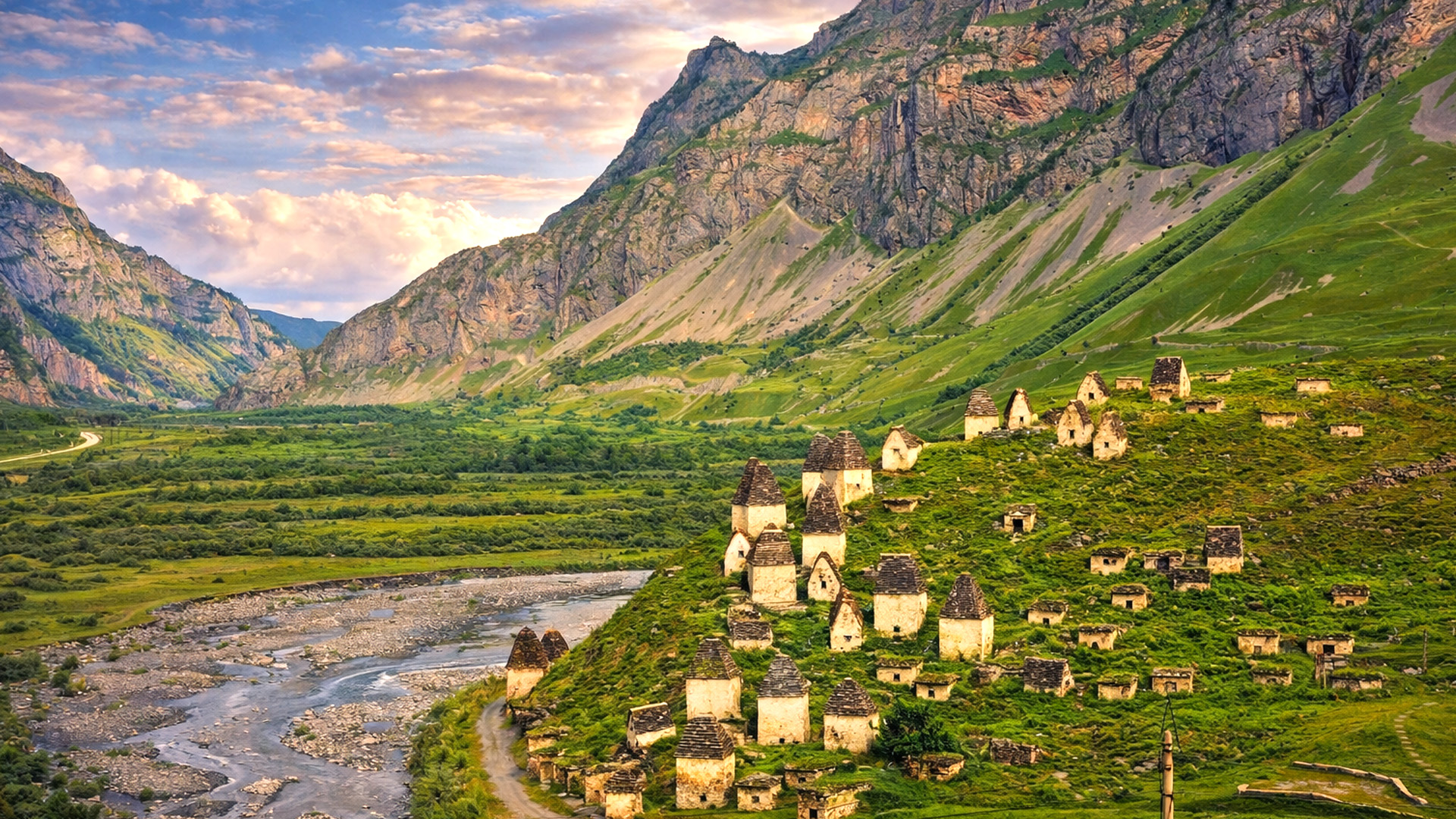A mountain valley covered in old burial structures