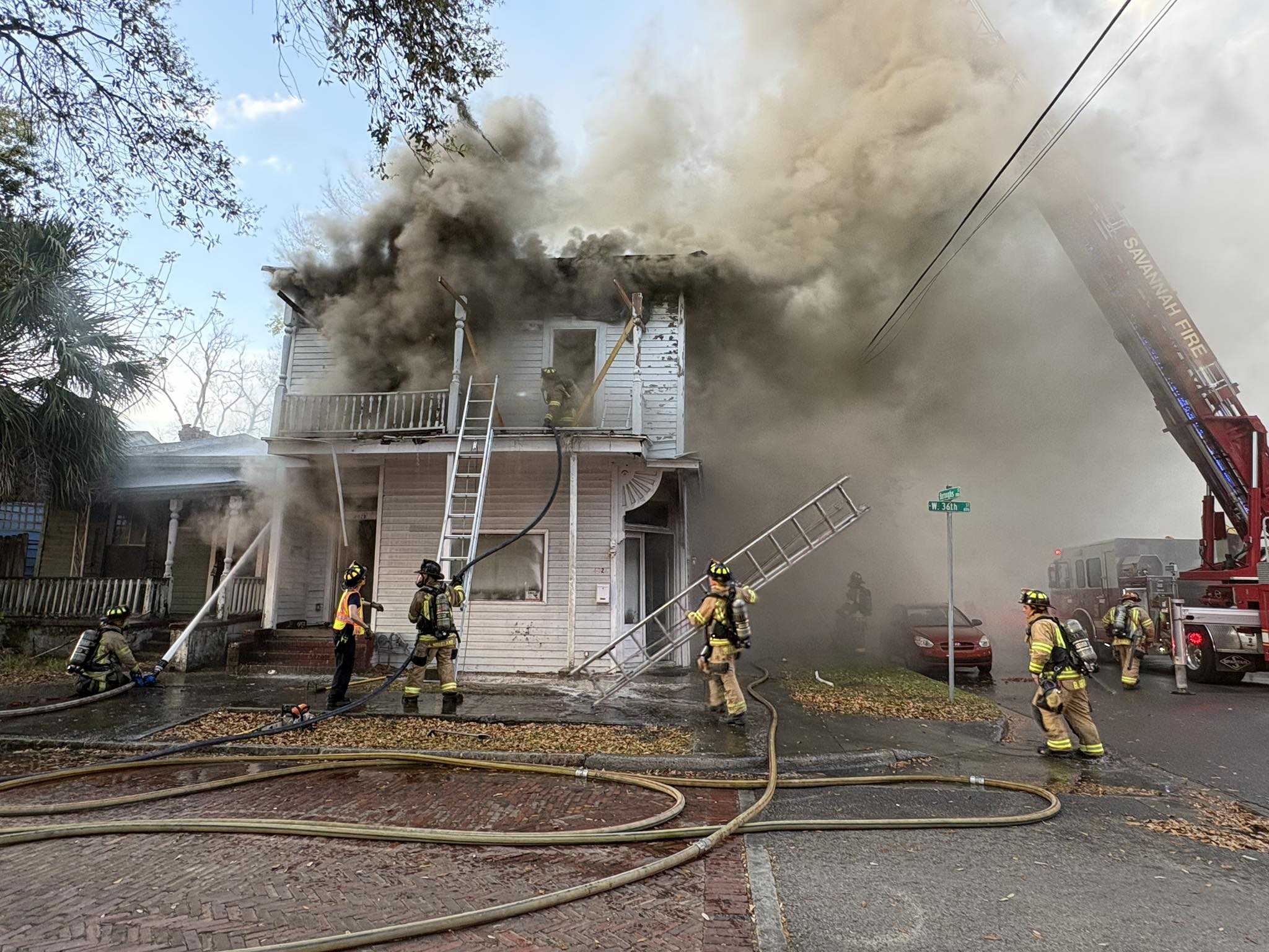 Thick smoke seen as firefighters battle house fire in Savannah