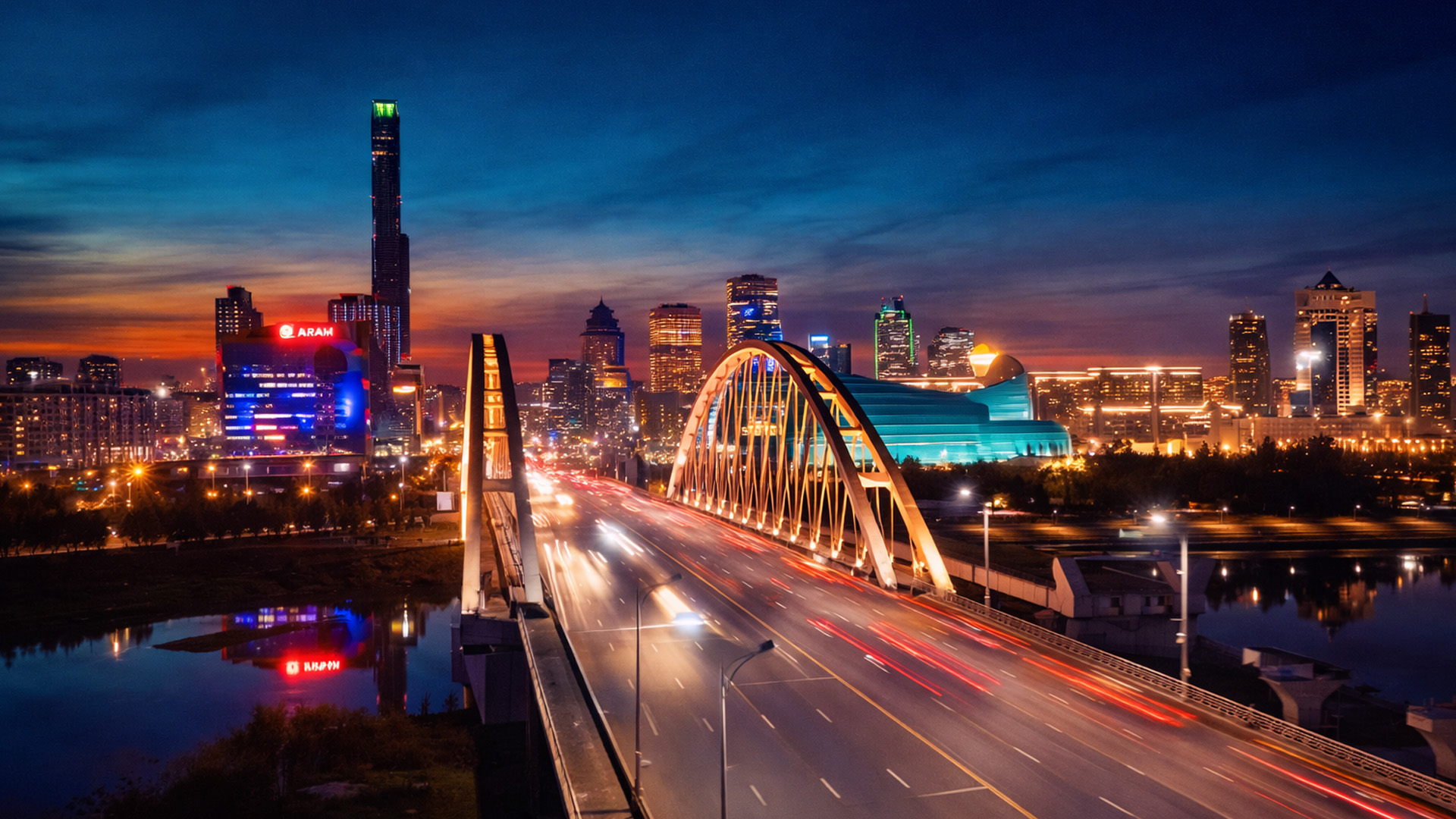 The night skyline built around a river and lighted structures