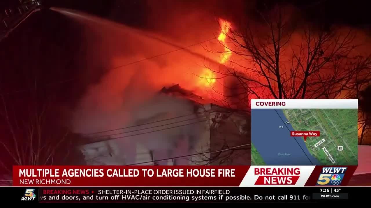Massive flames rip through roof of home in New Richmond
