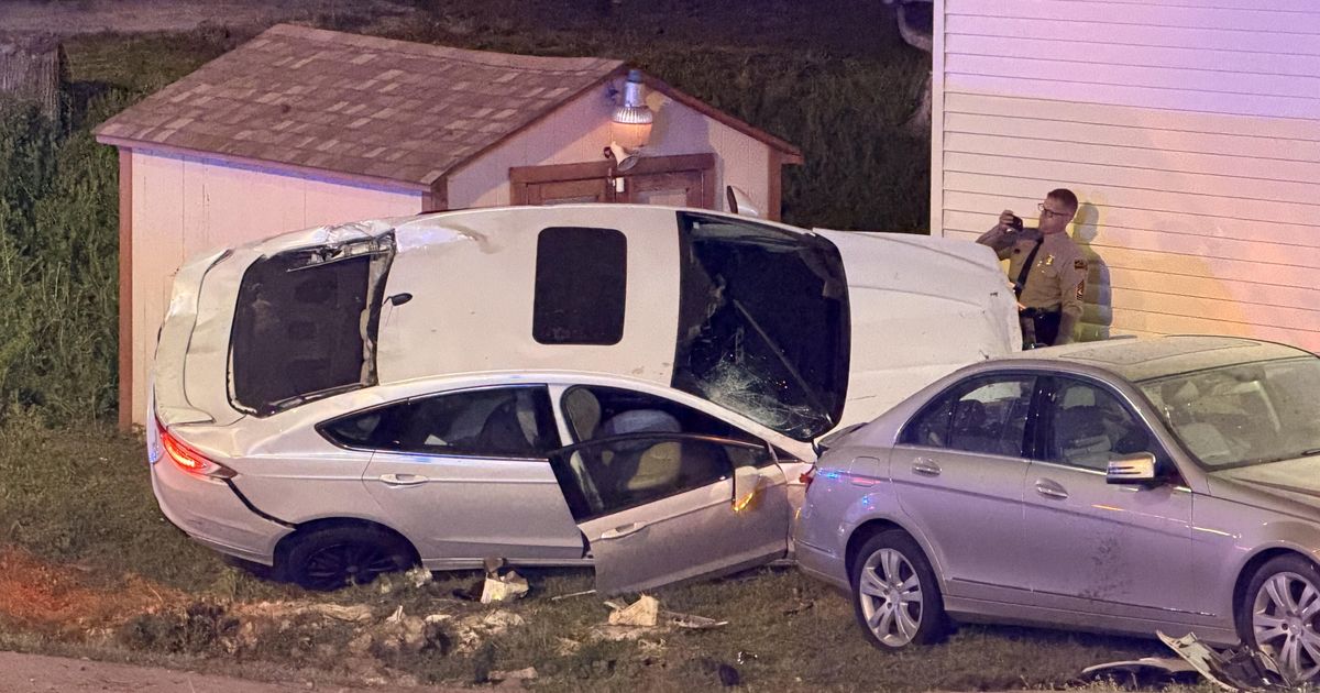 Car smashes into parked car in Durham driveway, ends up on its side