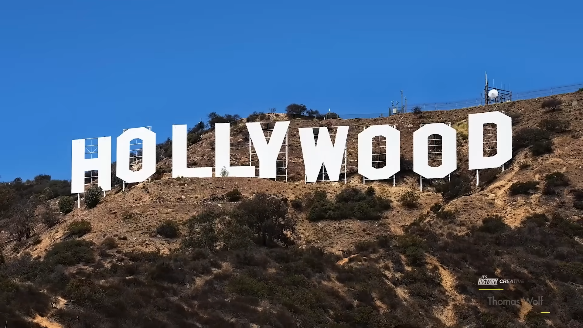 8-foot fences, cameras, and patrols protect one of the most famous signs