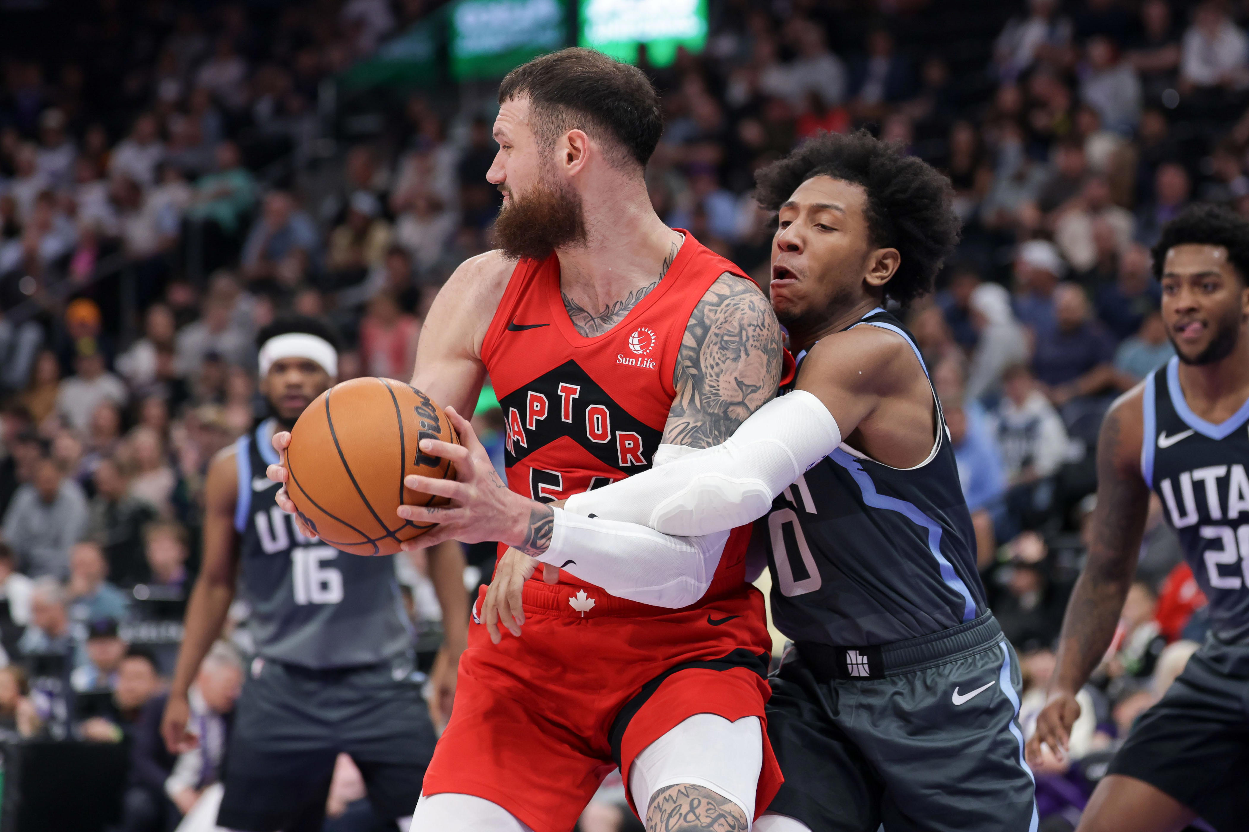 Former Vol records 13 points, nine assists for Jazz against Raptors