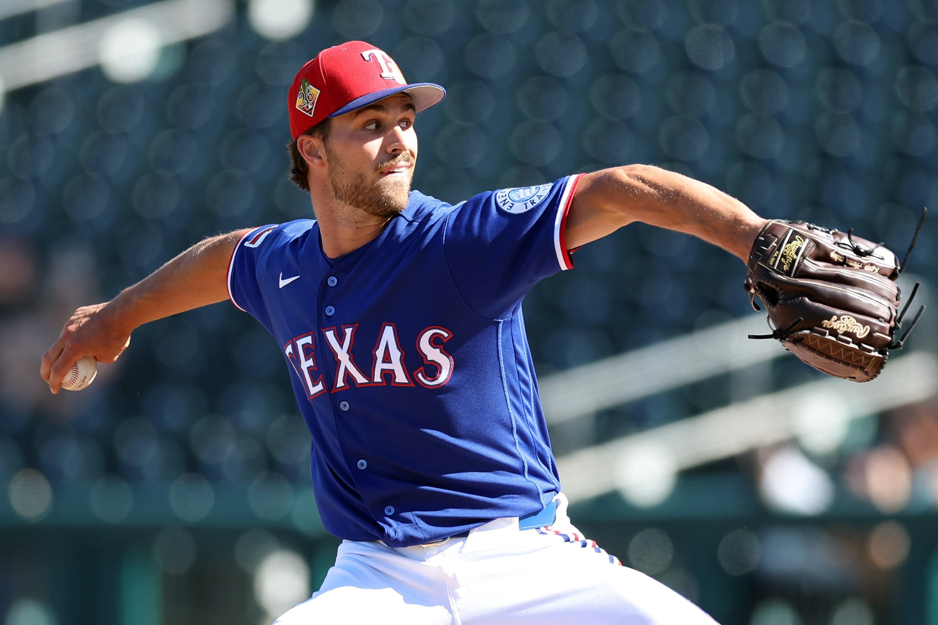 Rangers reliever finds out he made the team during surprising spring ...
