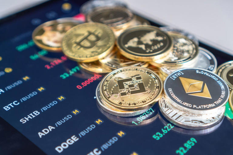 Bitcoin at $71,000, Ethereum, XRP, Dogecoin gain 1%