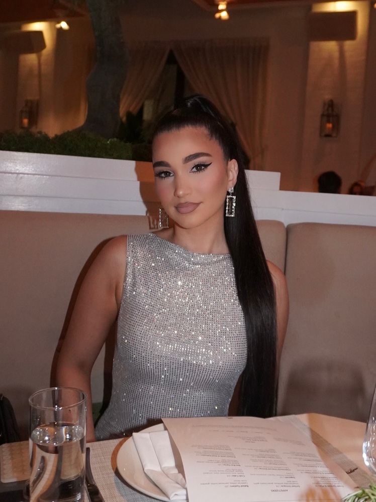Singer Enisa Nikaj turns heads in glittering silver look while ...