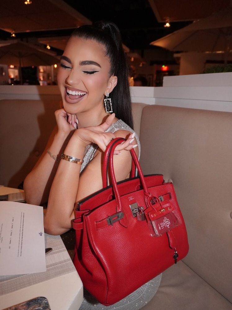 Singer Enisa Nikaj turns heads in glittering silver look while ...