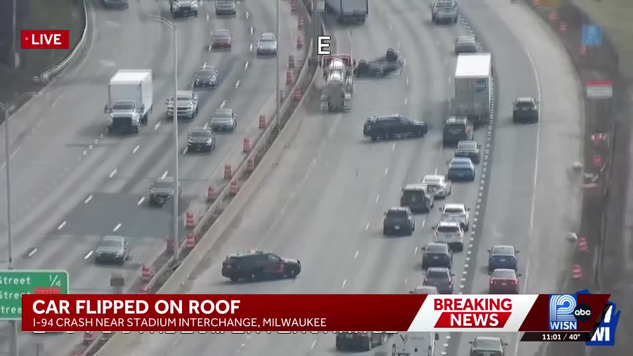 Car rolls over on I-94 eastbound near Stadium Interchange