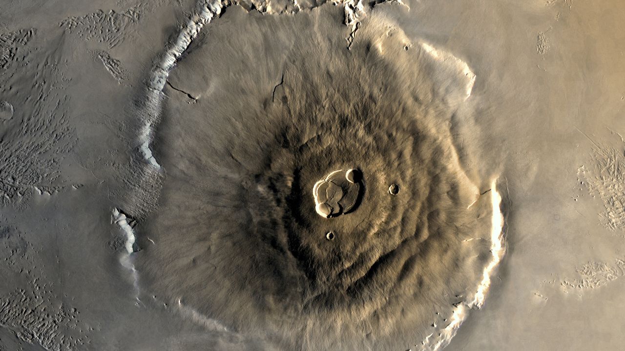A rare active volcano on Mars may be causing the whole planet to spin ...