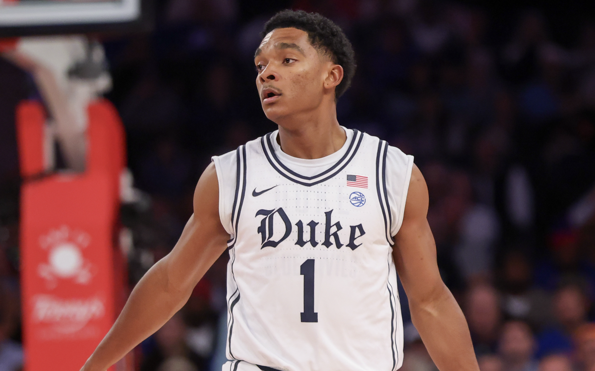 Caleb Foster supports Cam Boozer after winning Oscar Robertson Trophy ...
