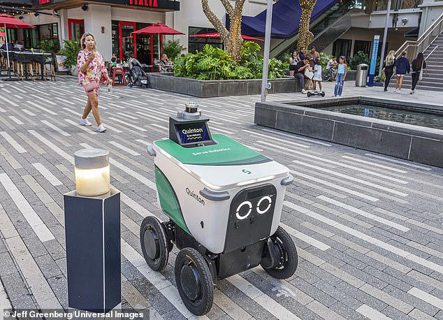 Delivery robot seen smashing glass of bus stop in Chicago