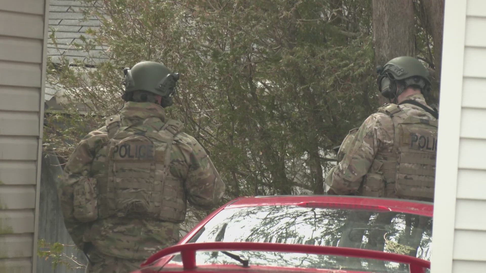 Shooting of officer leads to standoff, one now in custody