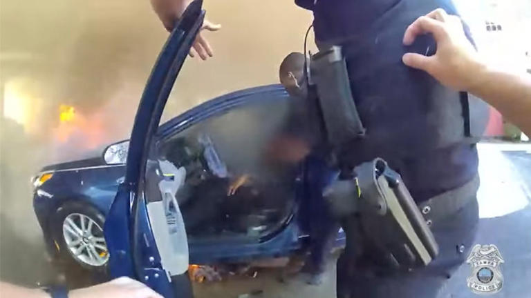 Tampa officers rescue man from burning car after medical emergency ...