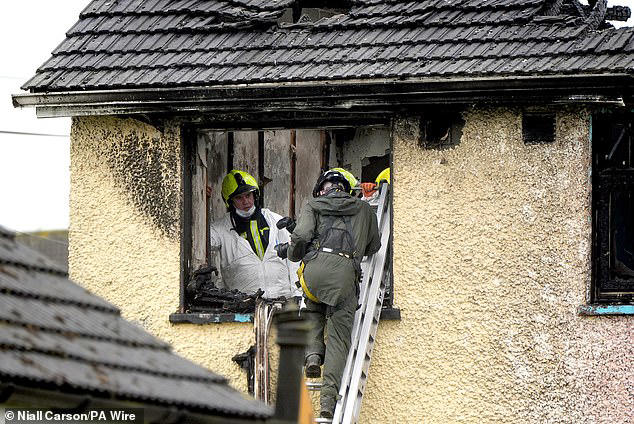 Man is found dead inside charred remains of home where boy and woman ...