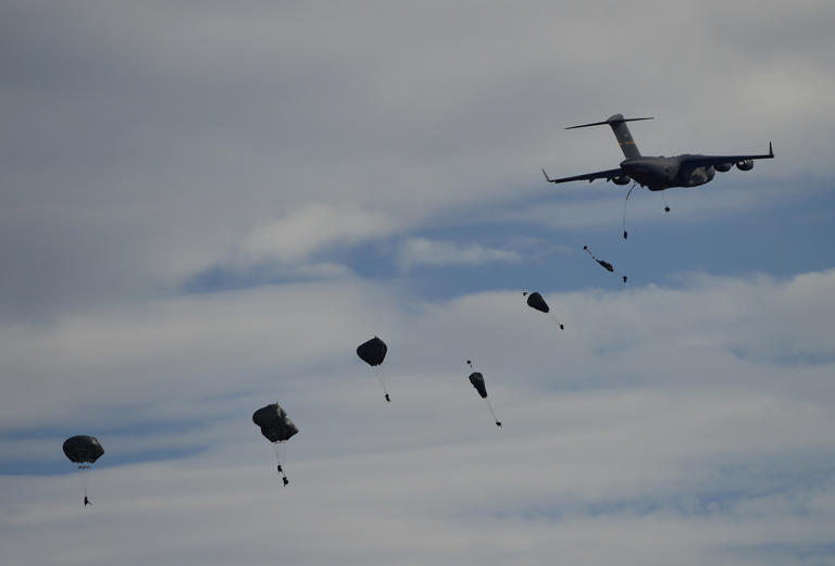 Why are marines and paratroopers being sent to Iran?