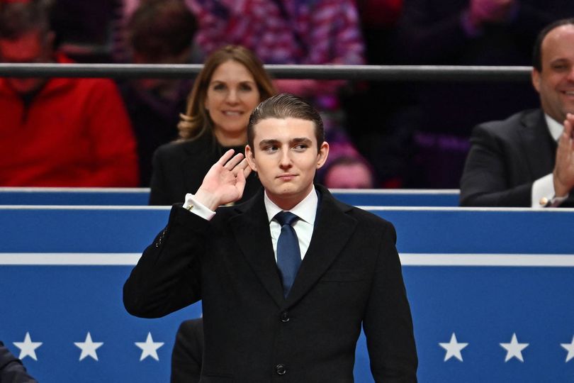 Barron Trump urged to enlist as Donald branded 'draft-dodging coward'