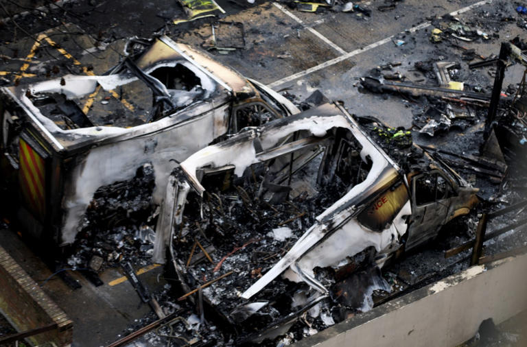 The charred remains of the ambulances in London.