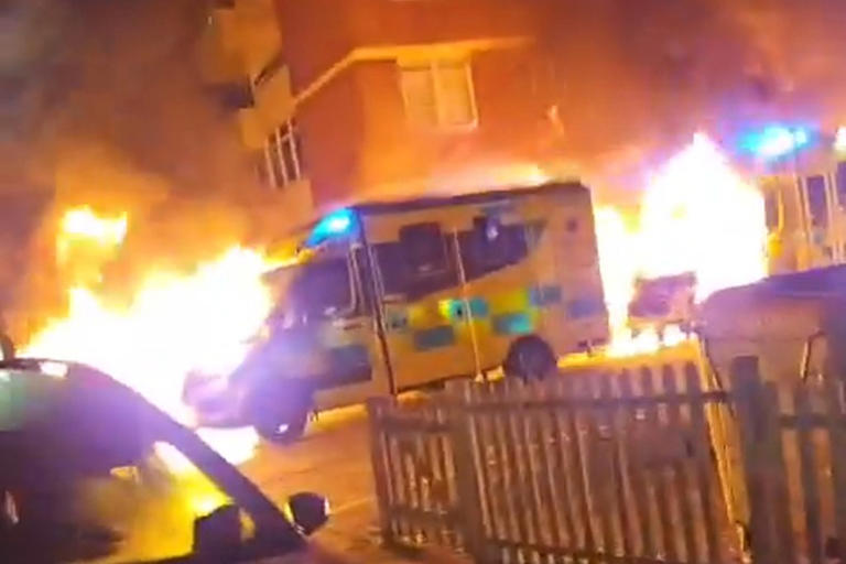 UK police arrest 2 men over arson attack on ambulances belonging to ...