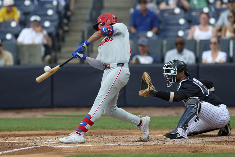 Phillies select Christian Cairo, designate Garrett Stubbs for assignment