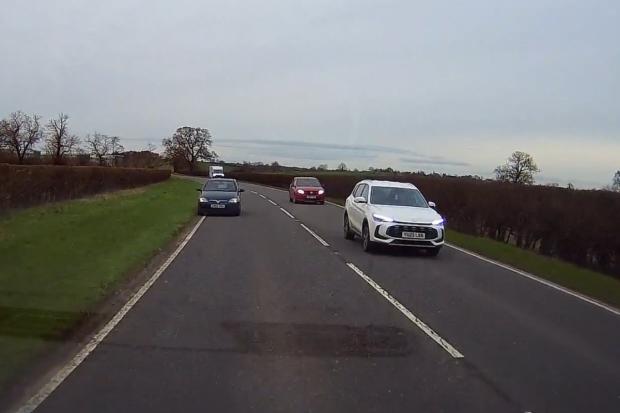 Watch shocking moment driver has near miss just moments before head on ...