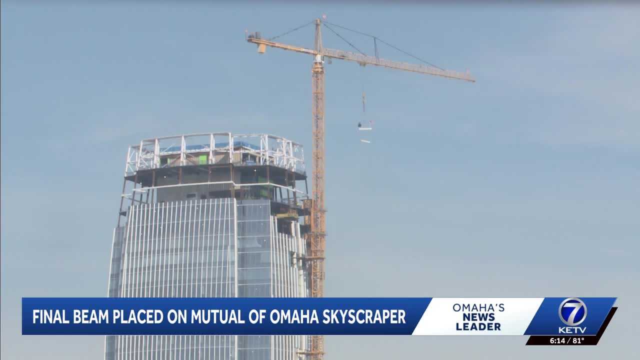 'Experience what the building brings': Final beam placed on Mutual of ...
