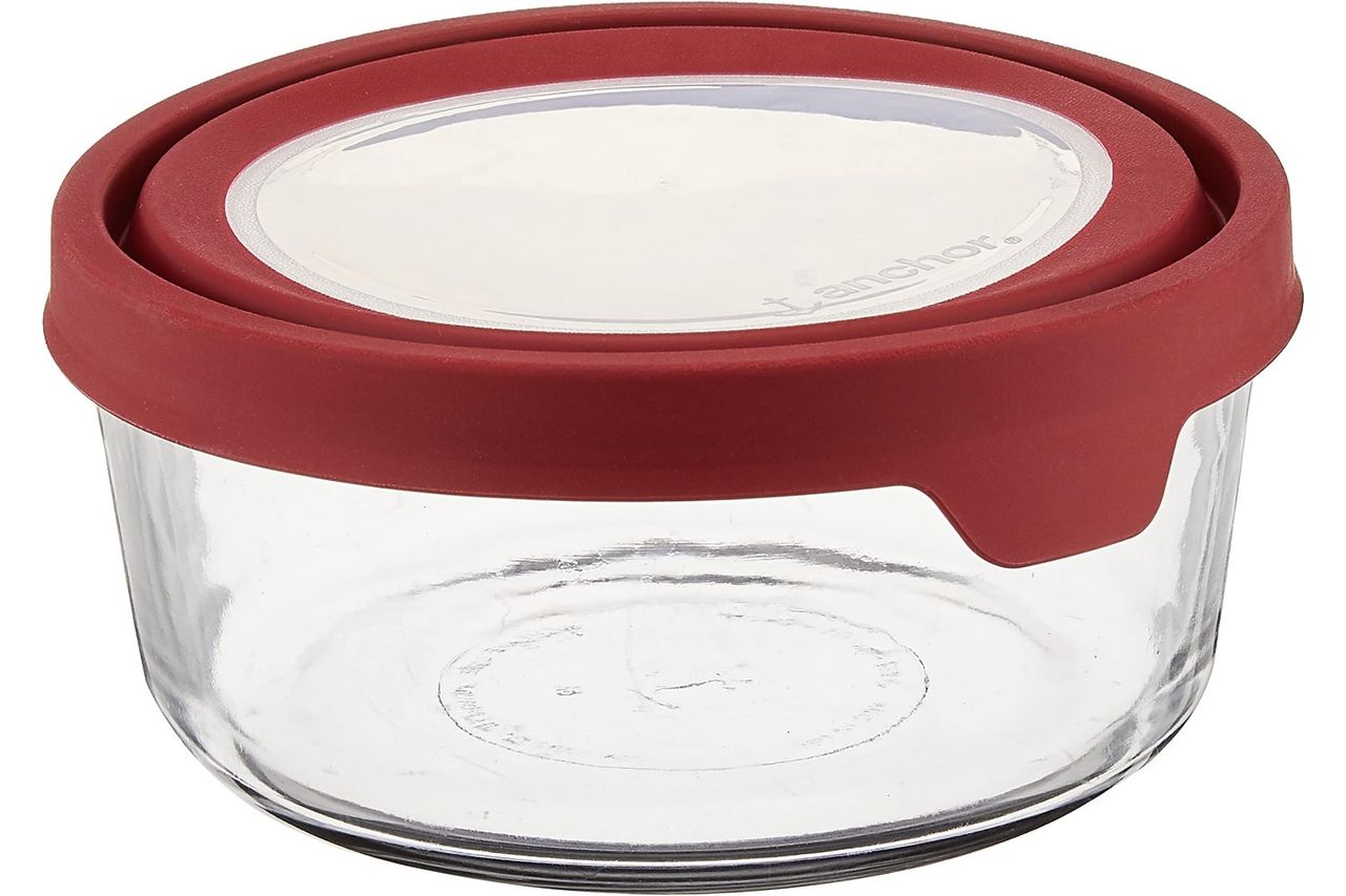 Glass storage container with a red lid