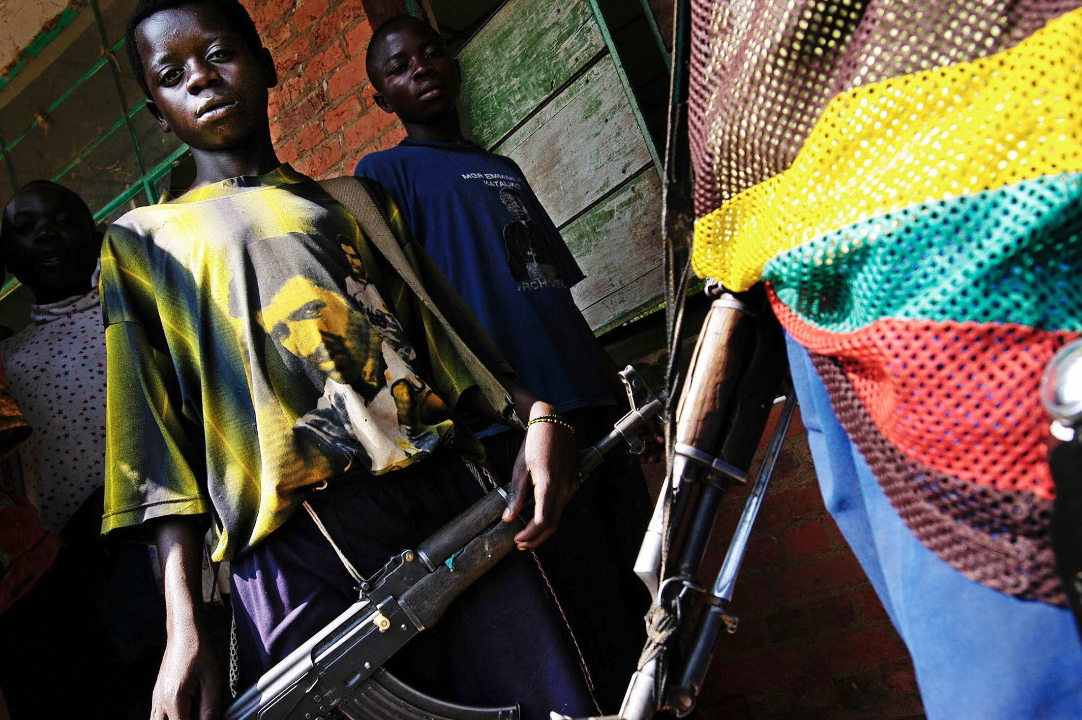 Children are used to fight, carry, cook, or serve was so-called ‘wives’ for the commanders (AFP/Getty)