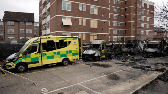 The burnt-out remains of Hatzola ambulances in Golders Green (PA Wire)