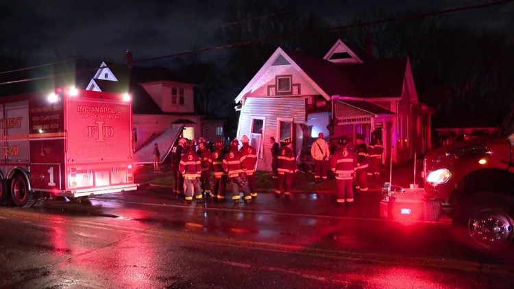 Driver hospitalized after car crashes into 2 homes on Indianapolis ...