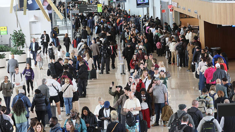 LGA wait times snarl as crash investigation continues