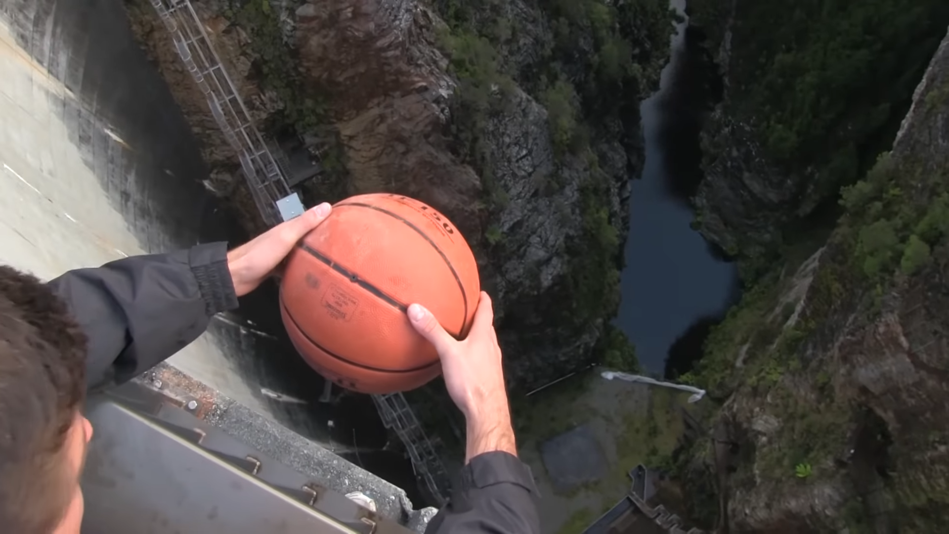 Watch what happens when a spinning basketball is dropped from 450 ft