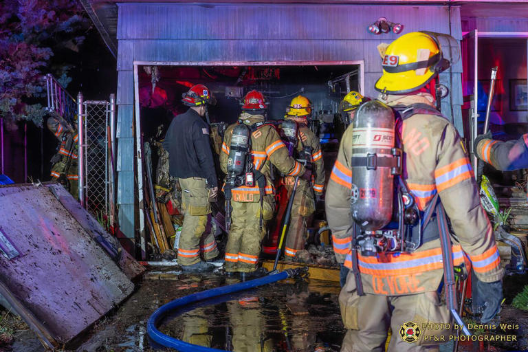 Firefighters rescue dog during garage fire in SE Portland